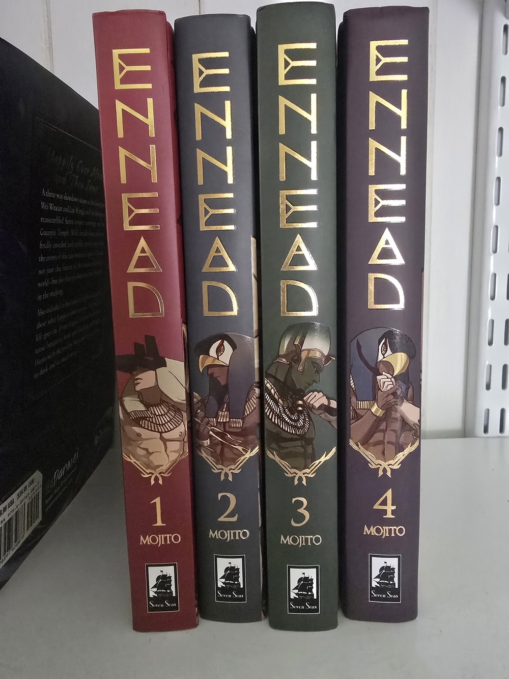 Ennead Vol. 1 - 4 Hardcover Graphic Novels